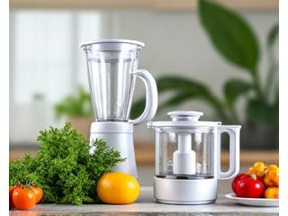 Assortment of high-quality kitchen tools, including a blender and food processor, on a clean countertop.